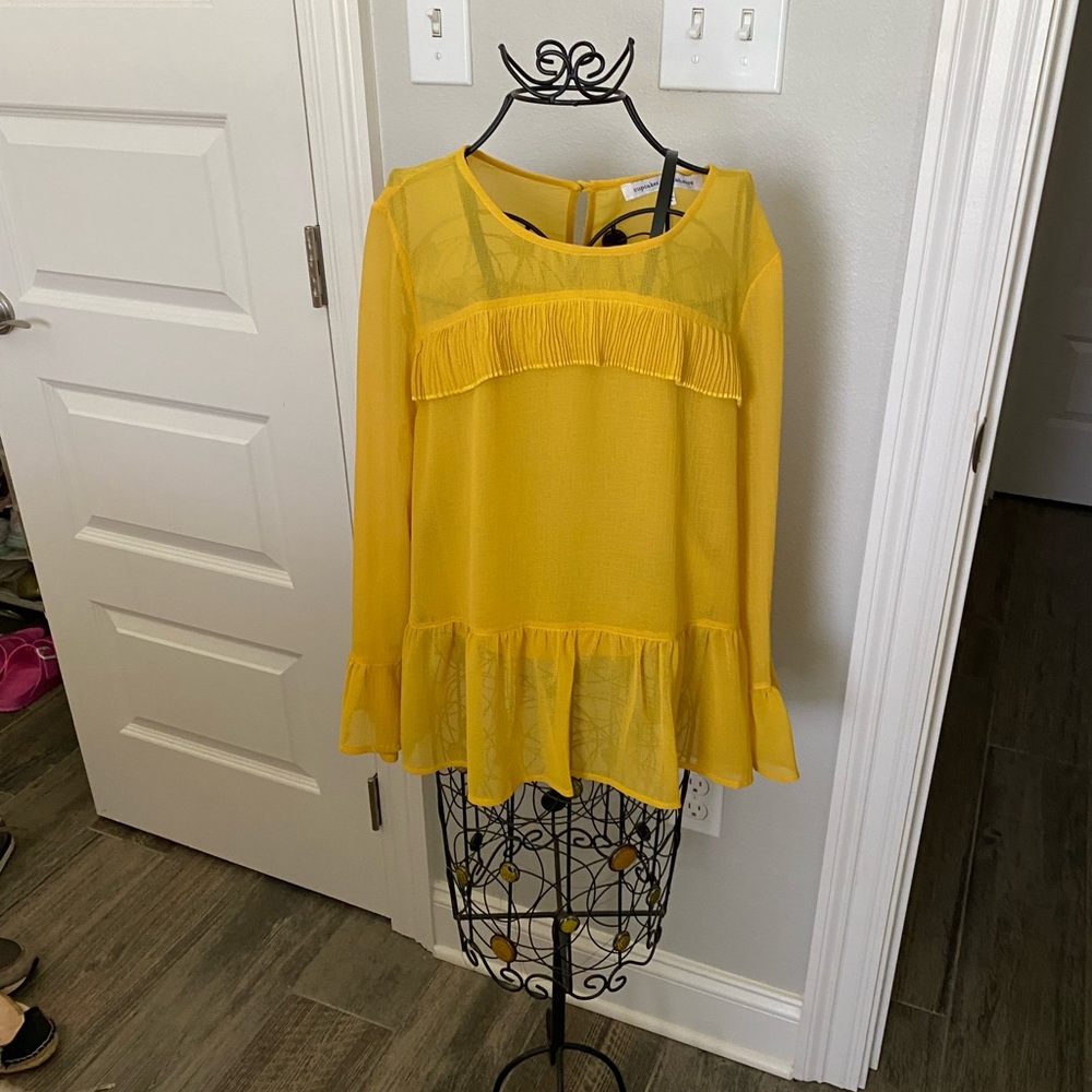 Cupcakes and cashmere shirt